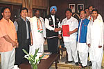 H.E. inviting Shri Dorjee Khandu to form the next Government, when the later along with AICC Central Observer V Narayanasamy, Congress leaders & party MPs called on him at Raj Bhawan: 24/10/2009
