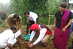 H.E. taking part in plantation programme at Raj Bhavan complex, organised by Muskan society, while First lady looks on:16/08/2009