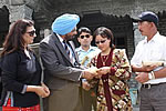 Governor along with First lady making cash contribution for construction of Tara Devi statue at Lumla