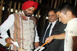 Governor Gen JJ Singh and Chief Election Commissioner Navin B Chawla at the Bamboo Processing Centre at Poma, near Itanagar: :04/06/2010