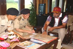 State Governor Gen. JJ Singh reviewing law and order related issues of the State with DGP in-charge Shri Tashi Lama at Raj Bhavan, Itanagar :13/07/2010