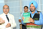 Governor releasing a book, titled &lsquo;Strengthening Indian Environment Laws &ndash; New Lessons and Approaches&rsquo; at Raj Bhavan on 24th August 2010. Author G N Sinha, CCF and Director,SFRI, Itanagar also seen in the pic: 24/08/2010