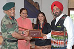Governor presenting a traditional memento of Mishmi pipe to Lt Gen V.K. Singh at Raj Bhawan during the call: 10/03/2010