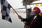H.E. Governor flagging-in the white water rafting expedition organised by the Assam Rifles at Pasighat : 19/02/2010 