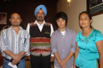 Governor with Master Teji and his parents Toko Jyoti and Toko Yaza at Raj Bhawan: 21/09/2010
