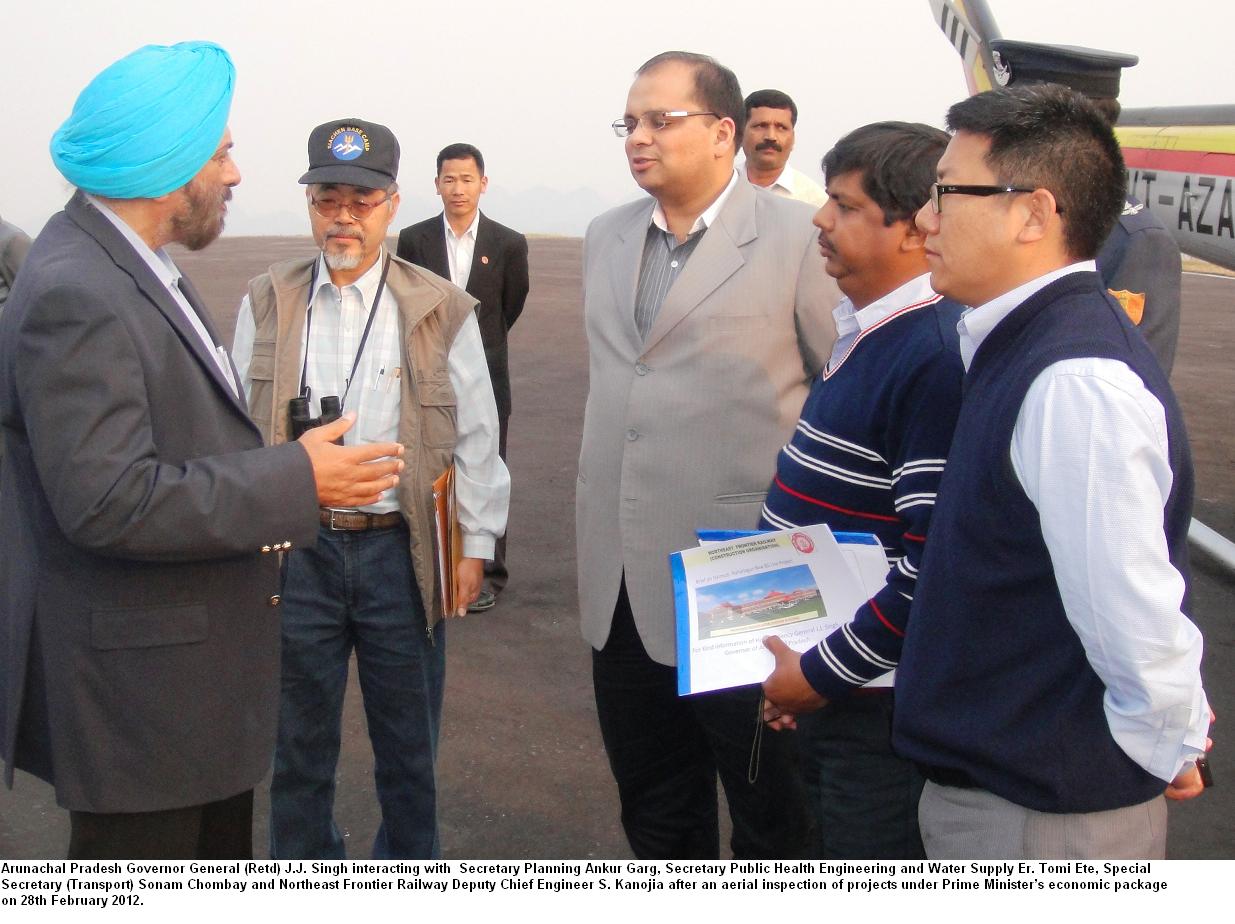 Governor General(Retd) J.J. Singh interacting with  Secretary Planning Ankur Garg, Secretary Public Health Engineering and Water Supply Er. Tomi Ete, Special Secretary (Transport) Sonam Chombay and Northeast Frontier Railway Deputy Chief Engineer S.Kanojia after an aerial inspection of projects under Prime Minsiter's economic package: 28/02/2012