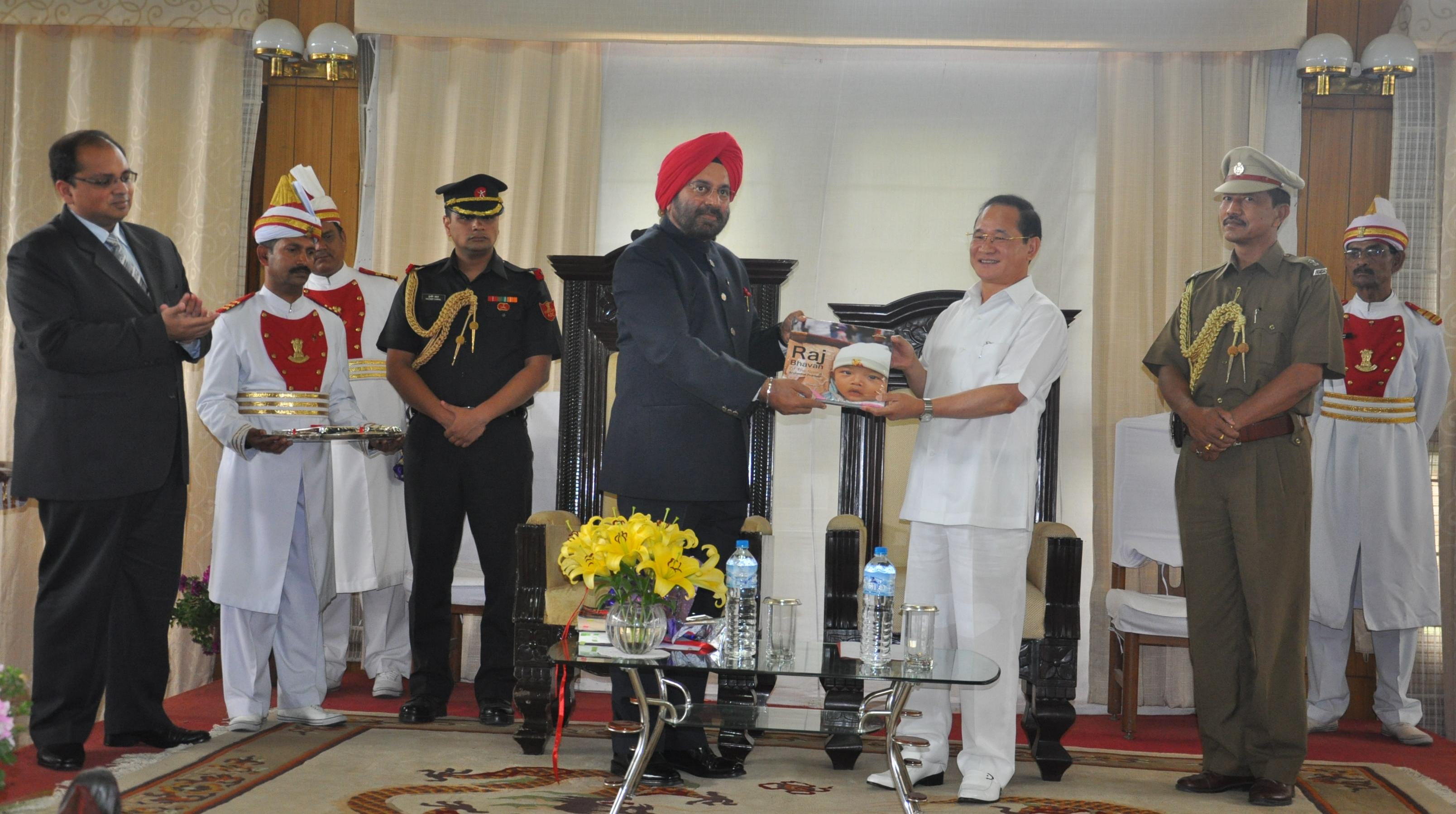 The Governor launched the Raj Bhawan Coffee table book, title �The Rising Arunachal Pradesh� at Raj Bhawan on.Also seen: Chief Minister of Arunachal Pradesh Shri Nabum Tuki  and Secretary to Governor Shri Ankur Garg: 31/03/2013