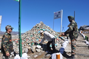 The Governor of Arunachal Pradesh Shri JP Rajkhowa, placing a stone on the �Heap of Stones� as a gesture towards strengthening Sino-India Friendship during his visit to the remote border post of Bumla in Tawang District on 25th October 2015 