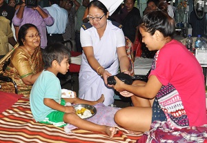 The First Lady of the State Smt Anuradha Roy distributing fruits to the indoor patients during her visit to Ramakrishna Mission Hospital, Itanagar on 11th July 2016.