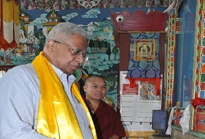 The Governor of Arunachal Pradesh Shri Tathagata Roy lighting a ceremonial lamp in the Buddhist Gompa, Itanagar on 10th July�2016.