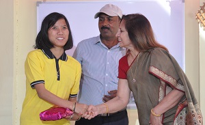 The First Lady of the State Smt Neelam Mishra giving prize to the best student of Donyi Polo Mission School for the Hearing and Visually Impaired during the �World Day for the Disabled� celebration, Chimpu, Itanagar on 3rd December 2017.