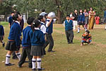 Childrens taking part in participatory games organised by the Raj Bhawan officials