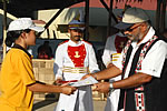 Governor presenting Golf training participation certificate