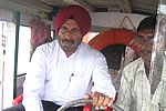H.E. navigating through Brahmaputra at Sonarighat, Dhemaji on 11th Aug, 2008