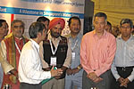 Governor giving patient hearing on the new techniques in the water reclamation plant during 2nd Singapore IWW