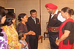 Governor interacting with Tapi Mra, Everester and his family members